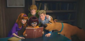 Will Forte, Zac Efron, Amanda Seyfried, Peter Welker e Gina Rodriguez in una scena di Scooby! recensione del film